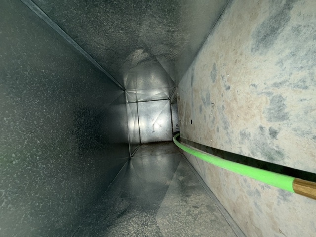 Residential attic duct after cleaning